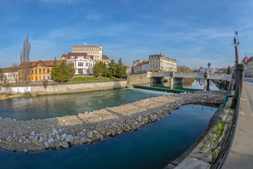 Fototapeta na wymiar View of the city center with Crisul Repede river in the foreground. Oradea, Romania