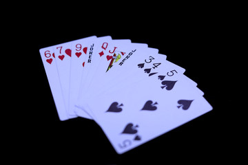 playing cards isolated on a black background,