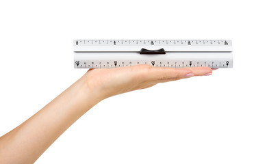 Gray metal ruler with handle. Measuring instrument.