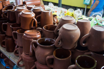 Clay cups in local market stall