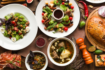 variety of restaurant dishes of national Georgian Armenian and Azerbaijani cuisine