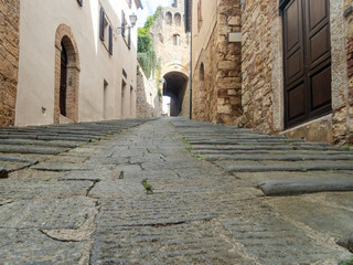 Colorful narrow streets in the medieval town of Massa Marittima in Tuscany - 4