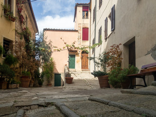 Fototapeta na wymiar Colorful narrow streets in the medieval town of Massa Marittima in Tuscany - 5