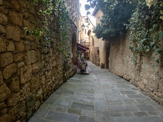 Colorful narrow streets in the medieval town of Massa Marittima in Tuscany - 8