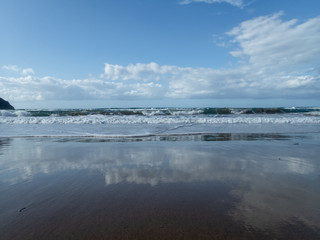 Waves and foam on the beach in the Baratti gulf in Tuscany - 2