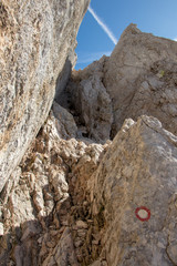 Narrow path to Triglav mountain peak