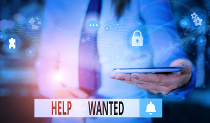 Text sign showing Help Wanted. Business photo text An ad in the paper an employer places to find a...