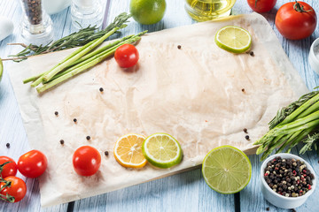 background for food Board parchment vegetables herbs composition