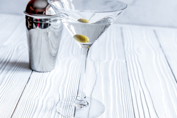 martini cocktail at wooden background close up
