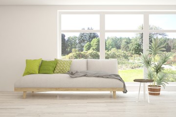 Stylish room in white color with sofa and summer landscape in window. Scandinavian interior design. 3D illustration