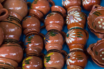 Clay cups in local market stall