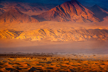 desert wind storm at sunset