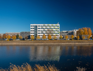 Fototapeta premium Modern architecture. Office building. Reflection on the water.
