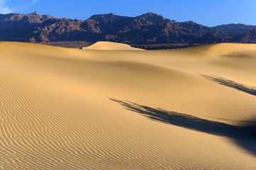 Fototapeta na wymiar shadows on sand dunes