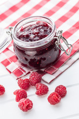 Sweet raspberry jam and raspberries.