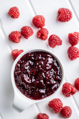 Sweet raspberry jam and raspberries.