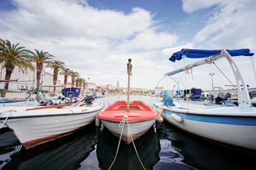 Fototapeta premium Travel by Croatia. Beautiful landscape with Split Old Town on sea shore. Boats at the harbour.