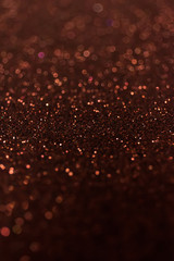 Abstract glitter shining lights background. De-focused lights