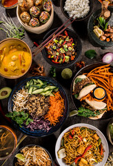 Asian food background with various ingredients on rustic stone background , top view. Vietnam or...