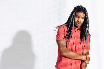 Portrait of a young man with cool hair in studio