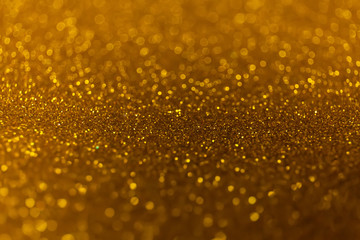 Abstract glitter shining lights background. De-focused lights