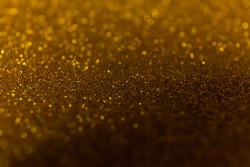 Abstract glitter shining lights background. De-focused lights