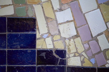 Abstract element of multicolored ceramic mosaic, selective focus.