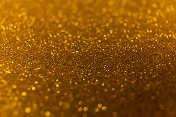Abstract glitter shining lights background. De-focused lights
