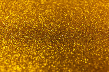 Abstract glitter shining lights background. De-focused lights