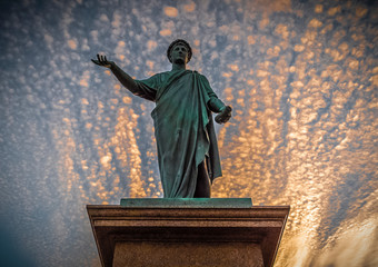 Monument to Duke de Richelieu against the backdrop of a picturesque sunset sky.