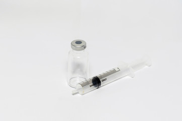 Medical syringe with  liquid on white background