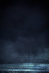 Empty background scene. Dark street reflection on the wet pavement. Rays neon light in the dark, neon figures, smoke. Night view of the street, the city. Abstract dark background. Abstract spotlight.