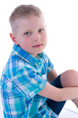 Portrait of little boy close-up, isolated.