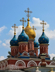Fototapeta na wymiar Blue and golden domes of orthodox church of St George in Varvarka street (Zaryadie park), Moscow, Russia