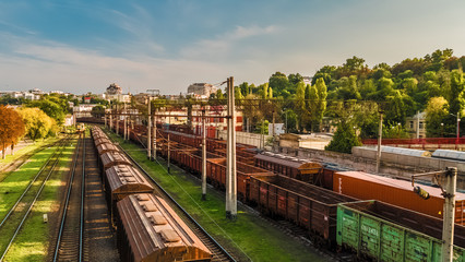 Freight trains stand on the railway in the city.
