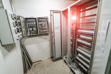 Electrical panel at a assembly line factory. Controls and switches.