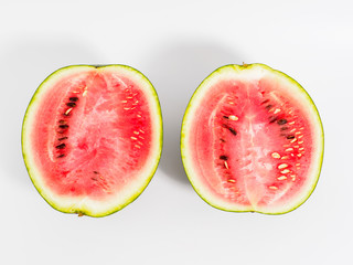 Halved watermelon on white background.