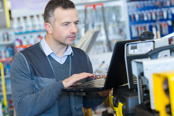 product disposal worker inspecting the order