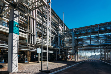 Obraz premium Chemical factory. Steel pipeline system for delivering components