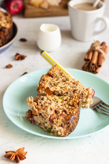 Oatmeal cake or baked oatmeal with apples and raisin. Dietary autumn pastries, healthy breakfast. 