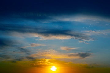 Colorful sunset in the evening sky. The nature and beauty of clouds