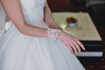 bride and groom holding their hands