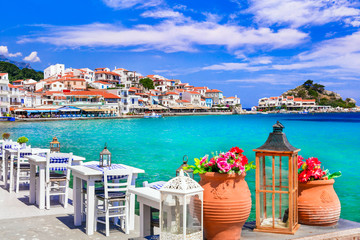 Fototapeta na wymiar Traditional Greek seaside taverns . beautiful Samos island, Kokkari village