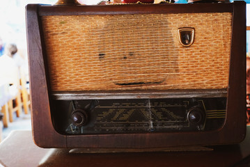 old vintage radio on the table in the street cafeteria