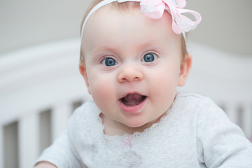 Close up Portrait of 7 Month Old Baby Girl with Flower hairband, Happy Cute Baby with Big Blue Eyes, Happy  family concept, The most Beautiful Girl, Princesses 