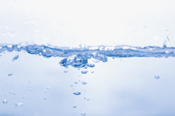 blue water splash and drop for drinking, abstract water pure and freshness concept background 