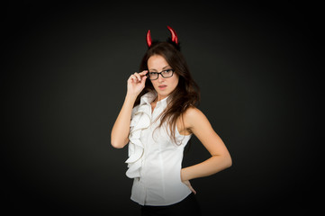 Tricky business lady. Girl red horns celebrate Halloween. Carnival concept. Trick or treat....