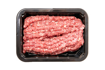 Ground beef in a black plastic tray isolated on white background. Uncooked mincemeat. Forcemeat,...