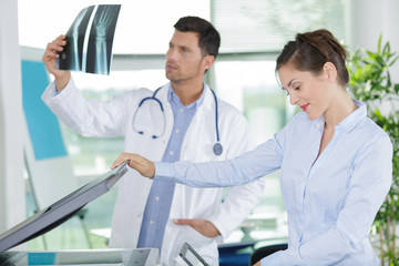 young businesswoman prints in hospital