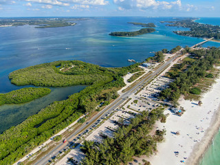 Aerial view of Coquina Beach with white sand beach and the main road, Anna Maria Island, Florida. USA - obrazy, fototapety, plakaty